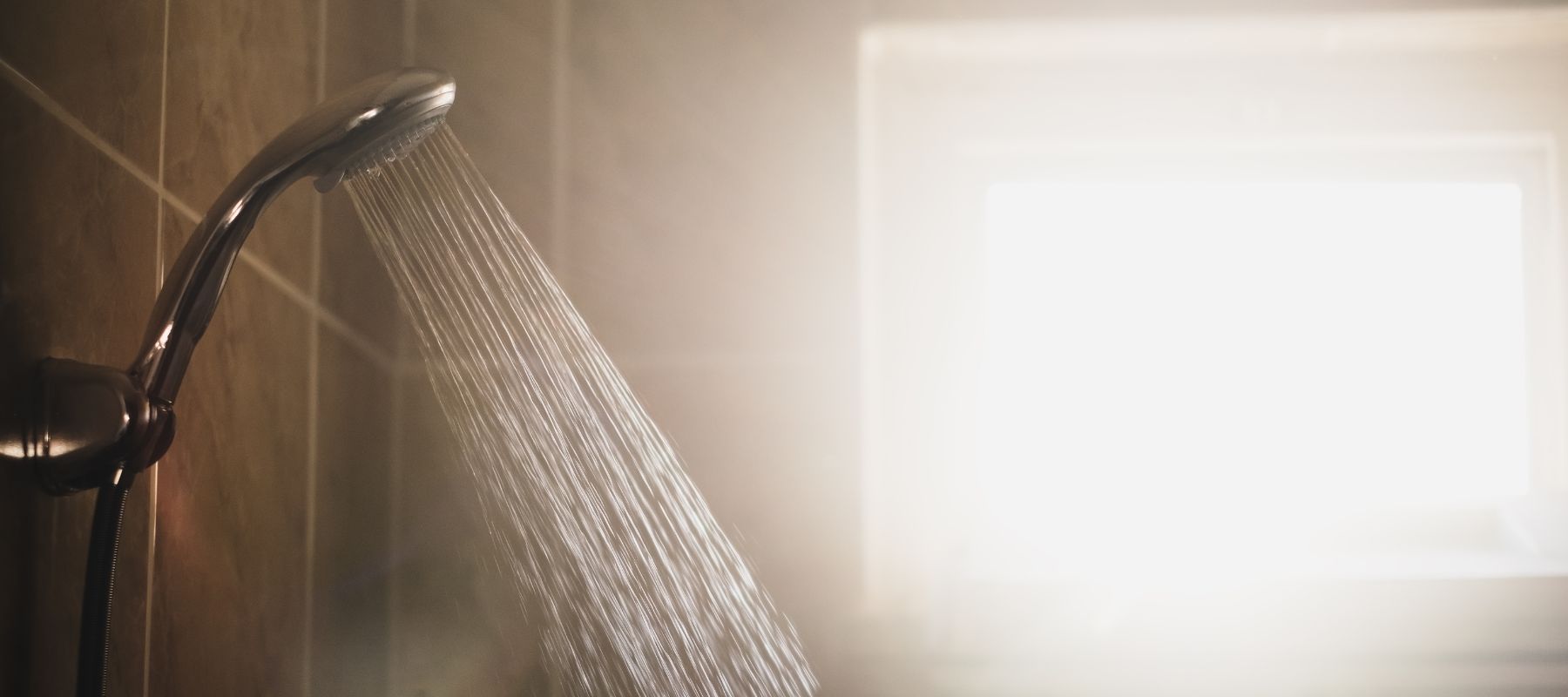 tankless water heater heating up a shower