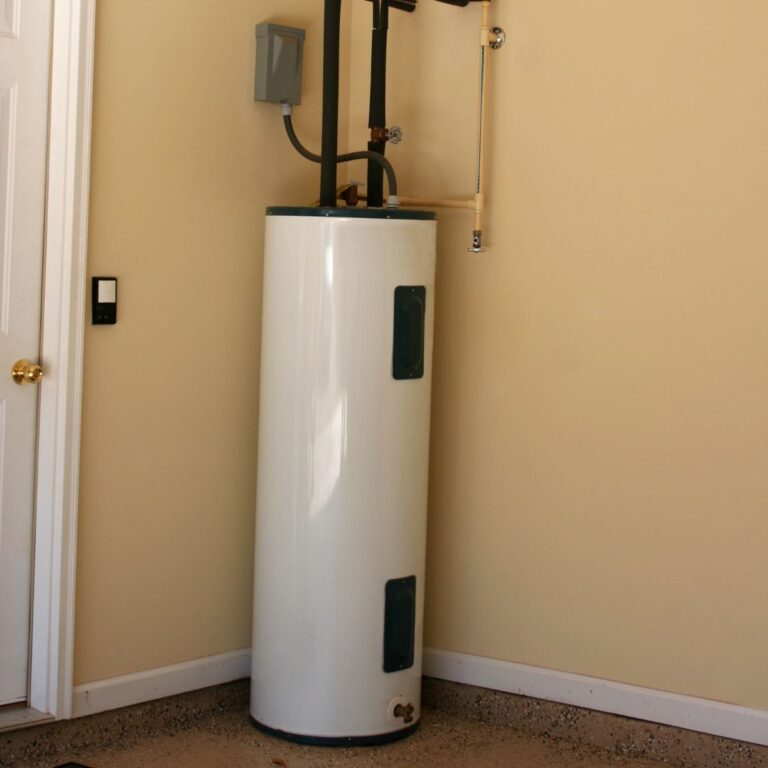 water heater installed in the corner of the garage