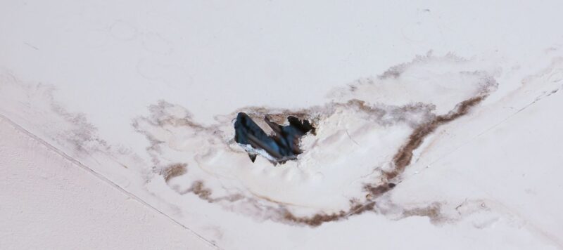 closeup of a ceiling damaged with water damage due to a leak