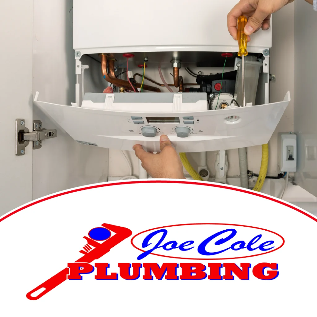 A technician opening the panel of a boiler system with a screwdriver, featuring the Joe Cole Plumbing logo