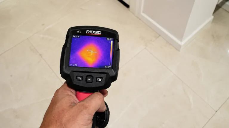 Thermal imaging camera detecting a hidden water leak beneath a residential floor in South Florida.